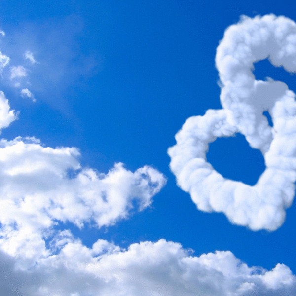 Love hearts clouds in blue sky wide 500